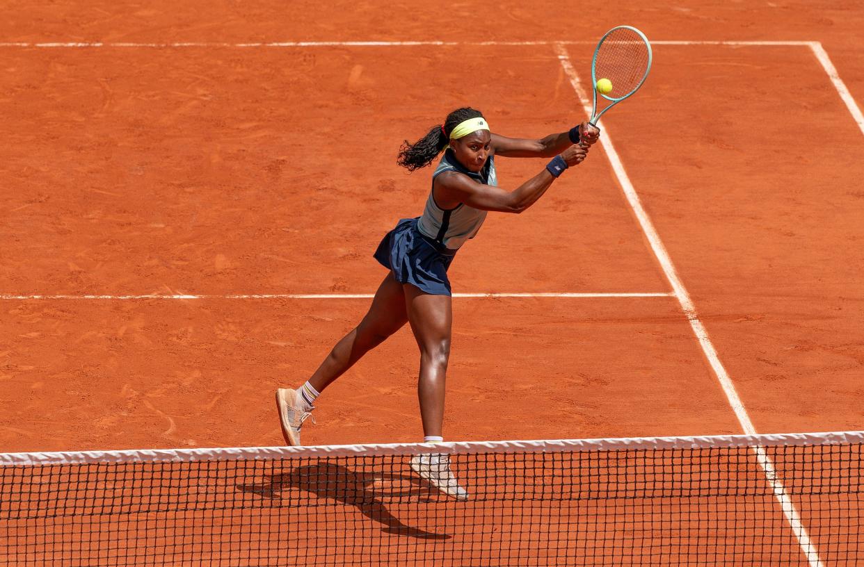 Jun 9, 2024; Paris, France; Coco Gauff of the United States returns a shot during the women’s doubles final with Katerina Siniakova of the Czech Republic against Sara Errani of Italy and Jasmine Paolini of Italy on day 15 of Roland Garros at Stade Roland Garros. Mandatory Credit: Susan Mullane-USA TODAY Sports